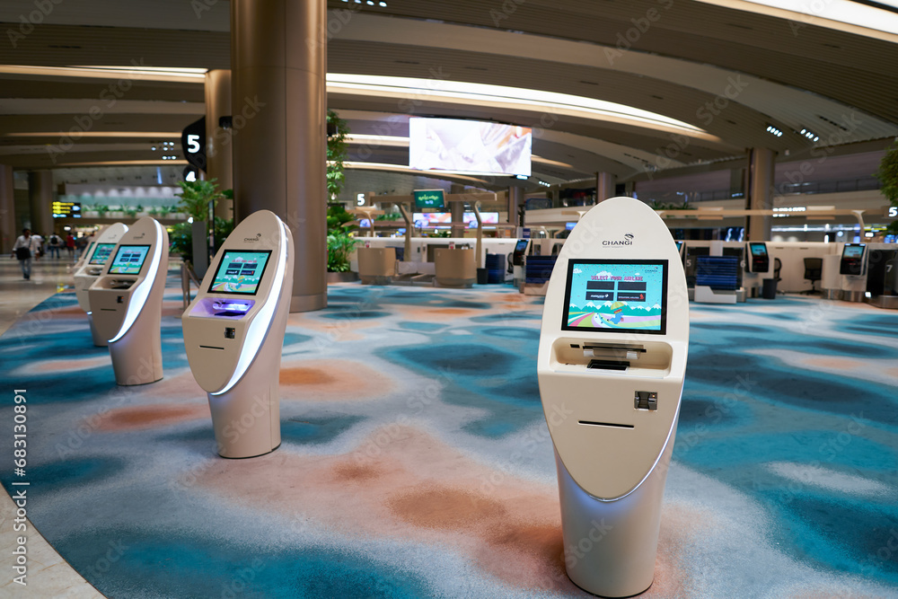 SINGAPORE - NOVEMBER 06, 2023: self check-in kiosks in Singapore Changi ...