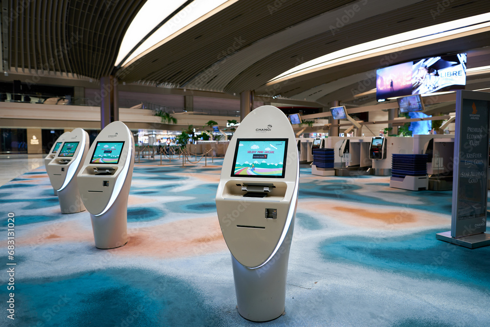 SINGAPORE - NOVEMBER 06, 2023: self check-in kiosks in Singapore Changi ...