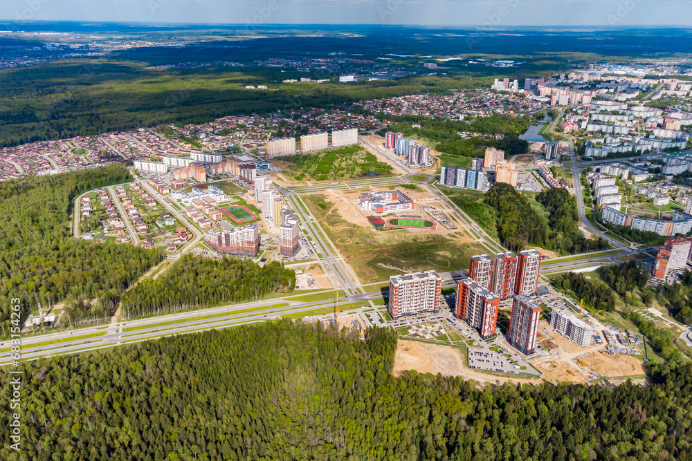 View of urban development from a great height due to the forest. Obninsk city, Russia