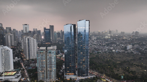 Jakarta downtown buildings at sunset. 