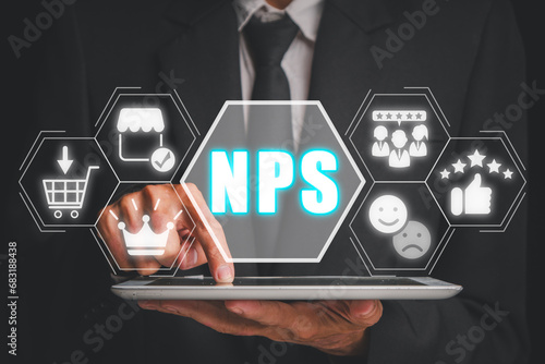 NPS, net promotor score concept, Businessman using digital tablet with net promotor score icon on virtual screen. photo