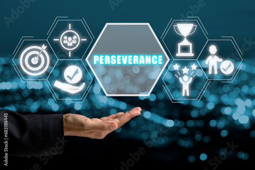 Perseverance concept, Businesswoman hand holding perseverance icon on virtual screen.