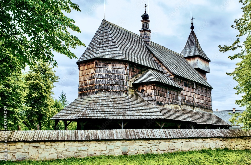 An 18th century wooden church on the territory of the Museum of Folk Architecture in Sanok, Poland. An 18th century wooden church on the territory of the Museum of Folk Architecture in Sanok, Poland.
