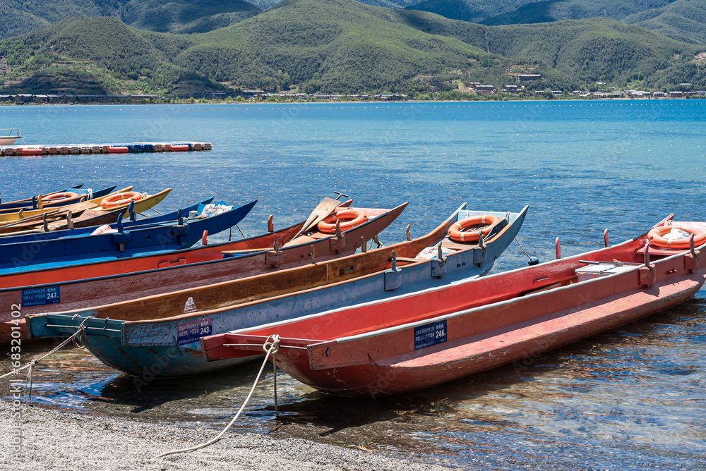 Piggery boats docked on Lugu Lake