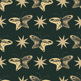 Seamless mystical pattern. Butterflies moon and stars on a dark background