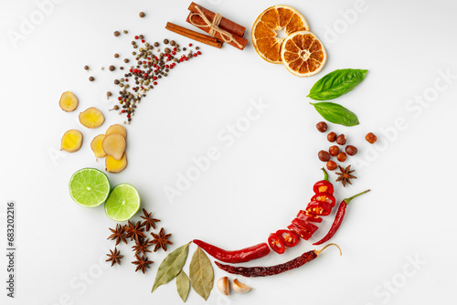 Fototapeta Naklejka Na Ścianę i Meble -  Dried oranges and spices isolated on white background