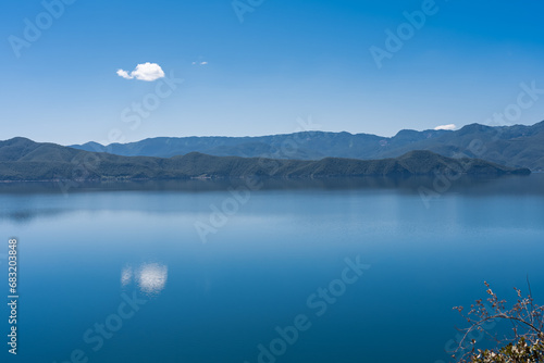 The Blue Sky and Clear Water of Lugu Lake in China photo
