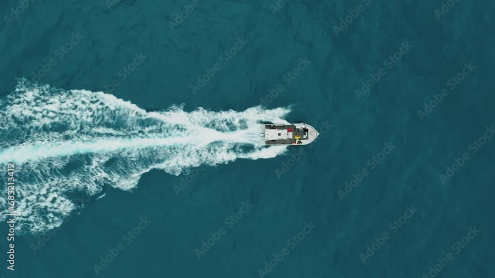 Aerial top view following science boat cruising in Sète, France Aerial top view following science boat cruising in Sète, France