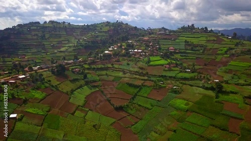 Farms And Plantations On Hills In The Kisoro District In Uganda - aerial drone shot photo