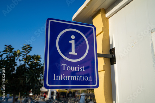 Blue Tourist Information sign outdoor.