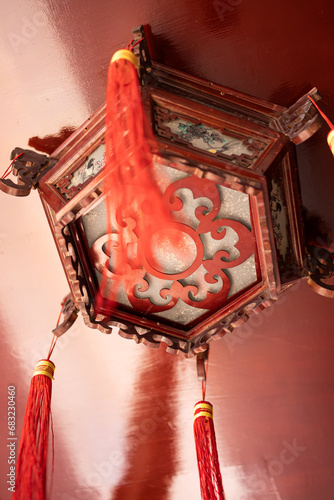Buddhist lamps hanging high in temples