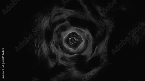 Seamless loopable dark horror tunnel with black rocky walls camera flythrough. Cinemagraph digital background for halloween. photo