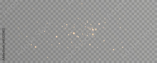 Golden sequins glow with many lights. Glittering dust. Luxurious background of golden particles.