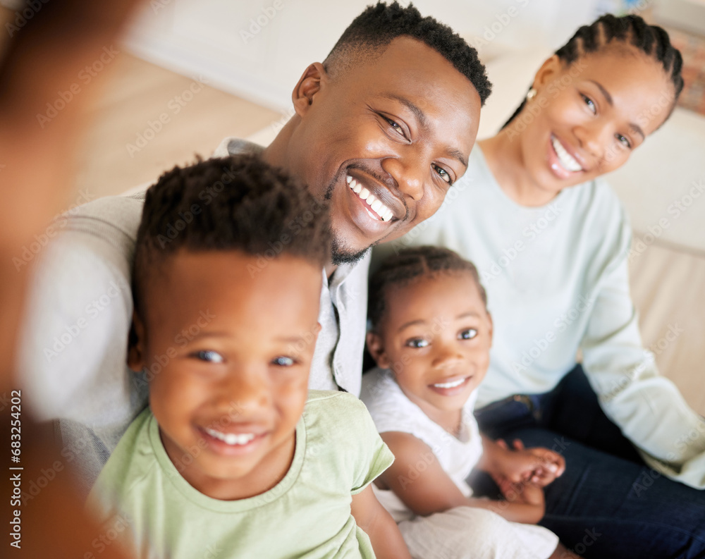 Selfie, happy family and children with smile in home for profile picture, social media and post. Parents, brother and sister with excitement with memory, bonding and together on sofa in living room Selfie, happy family and children with smile in home for profile picture, social media and post. Parents, brother and sister with excitement with memory, bonding and together on sofa in living room