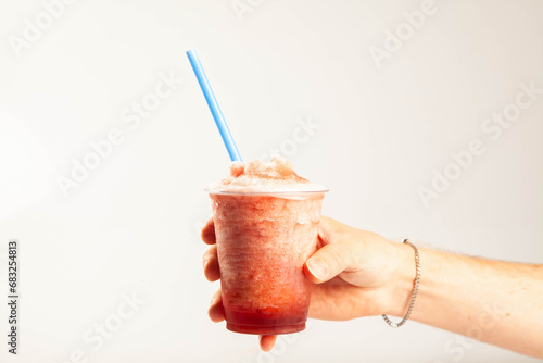Ice cold slush drink in take away plastic cup