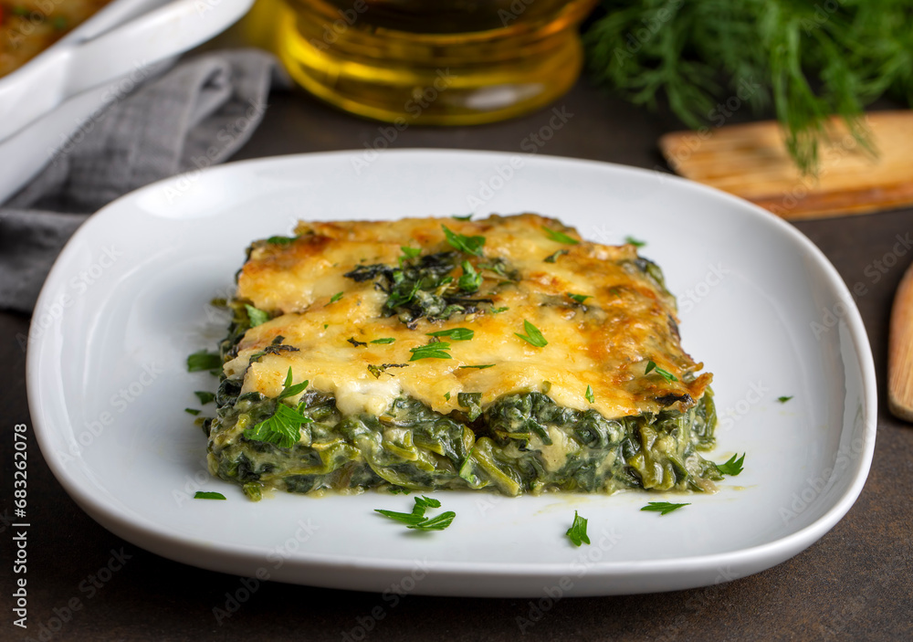Baked Spinach with cheese delicious Italian food cuisine. Spinach gratin. Baked Spinach with cheese delicious Italian food cuisine. Spinach gratin.