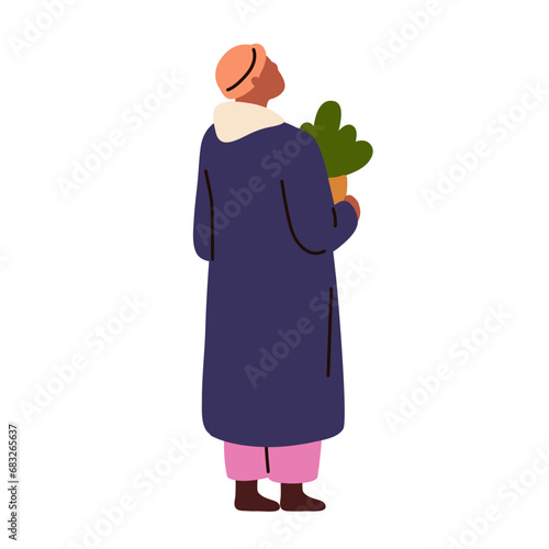 Winter holiday character with potted Christmas tree in hand. Black person hol...