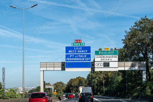 Highway road signs Paris, driving in heavy traffic on ring road of capital of France, traffic problems in Paris