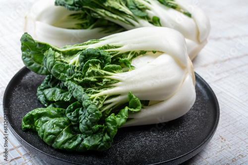 Young organic white bok choy or bak choi Chinese cabbage ready to cook photo