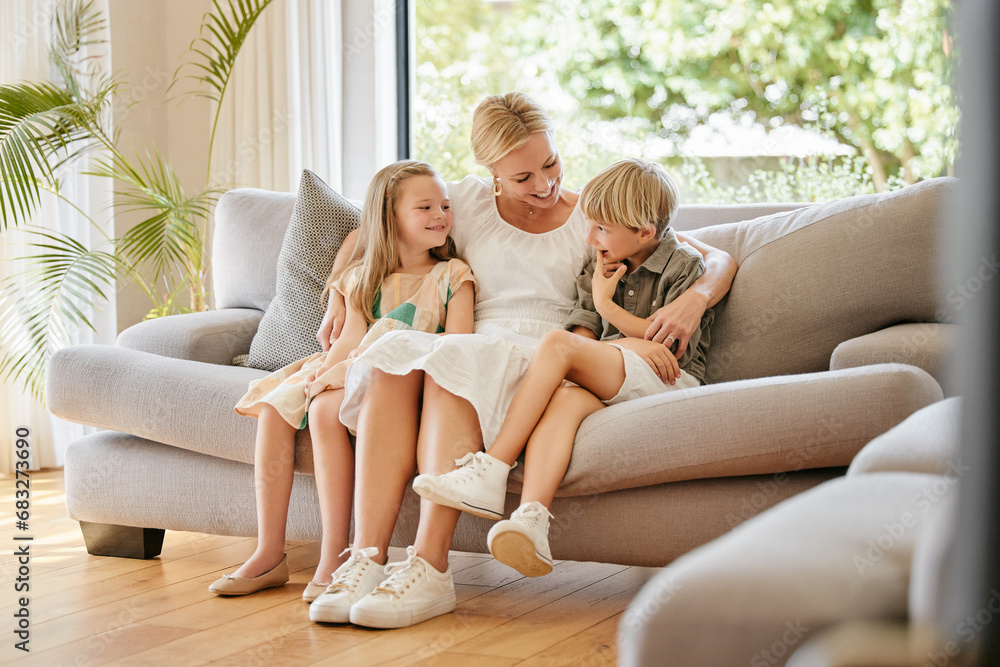 Smile, happy and children with mother on a sofa relaxing in the living room of modern house. Bonding, love and young kid siblings talking, resting and sitting with mom in the lounge at home. Smile, happy and children with mother on a sofa relaxing in the living room of modern house. Bonding, love and young kid siblings talking, resting and sitting with mom in the lounge at home.