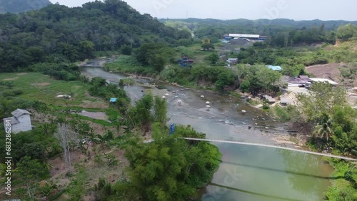 Pulau Mas tourist attraction, a tourist attraction located in the upper reaches of the Central River Regency where the water flows directly from the Meratus mountains, Meratus mountains, Mas Island photo