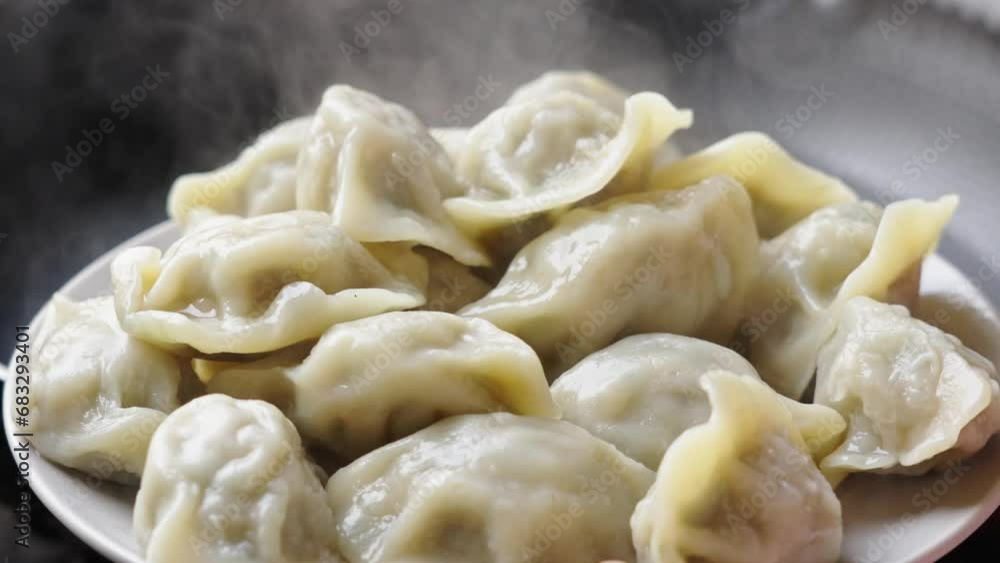 Close up fresh boiled dumplings Put on a plate Close up fresh boiled dumplings Put on a plate