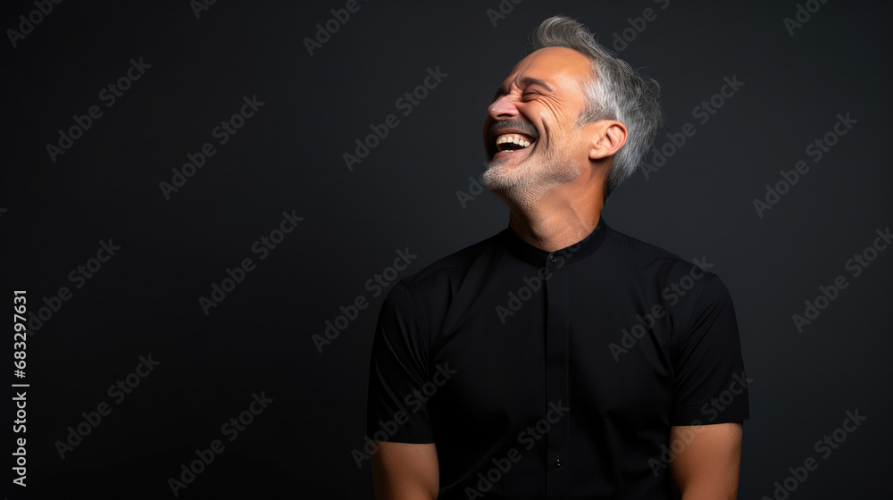 Confident 50-year-old male architect, smiling and laughing, wearing a Bright solid black dress