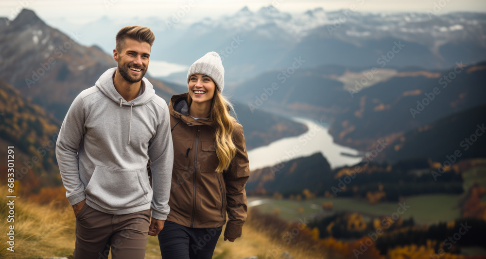 couple hiker walking on the top of the mountain