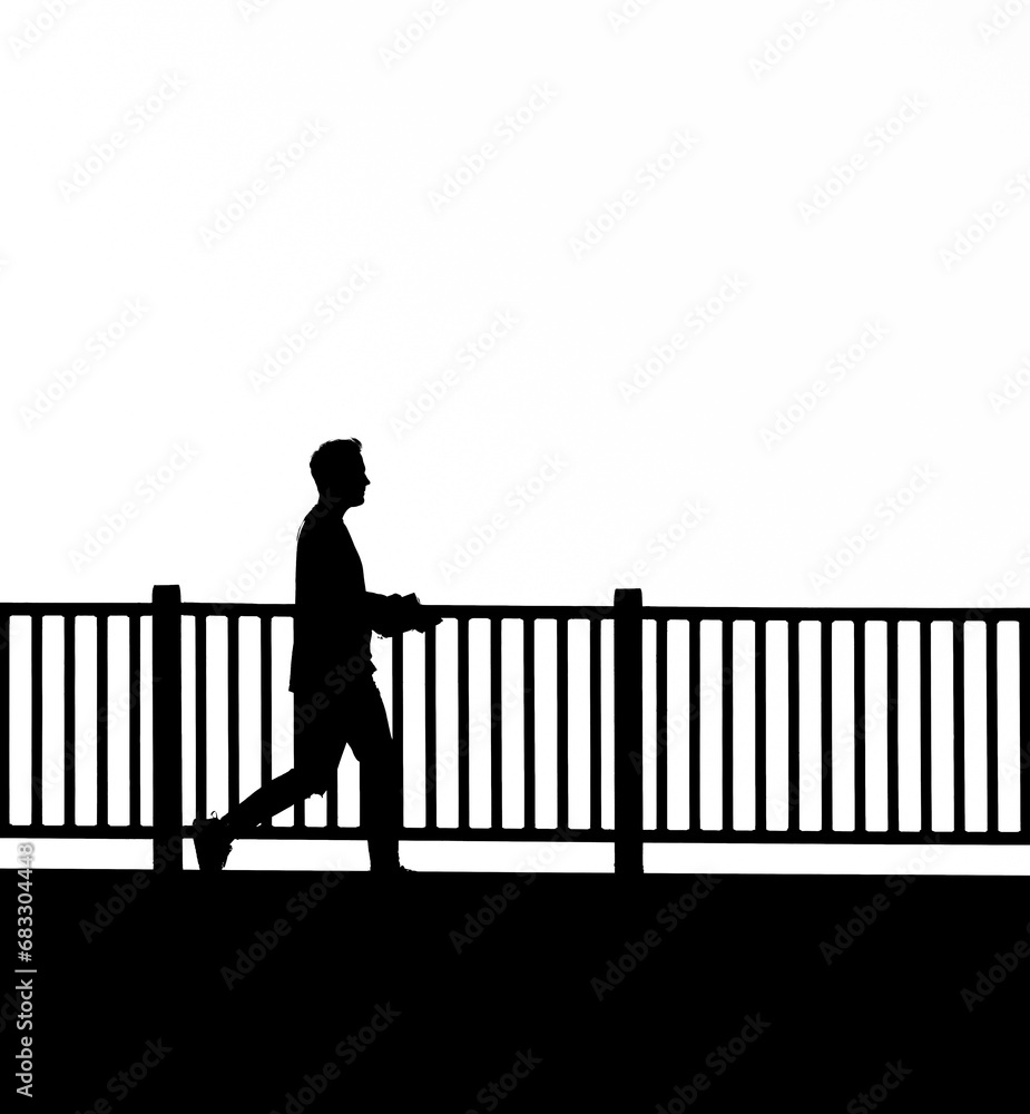 silhouette of a person on a bridge silhouette of a person on a bridge