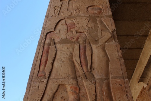 Inscriptions on the walls and columns of seti 1 temple in Abydos in Sohag in Egypt