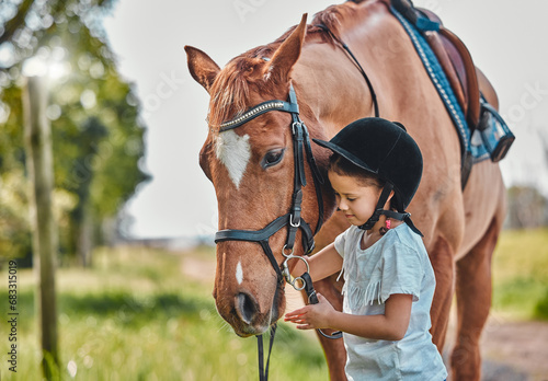 Happy, nature and child with a horse in a forest training for a race, competition or event. Adventure, animal and young girl kid with stallion pet outdoor in the woods for equestrian practice.