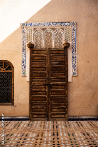 Obraz na płótnie Stunning view of the Bahia Palace during a sunny day. The Bahia Palace in Marrakech is an impressive example of Moroccan architecture and design. w salonie