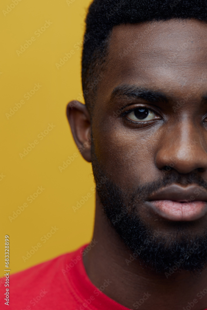 Obraz premium american man american beige fashion background portrait head orange african guy red black