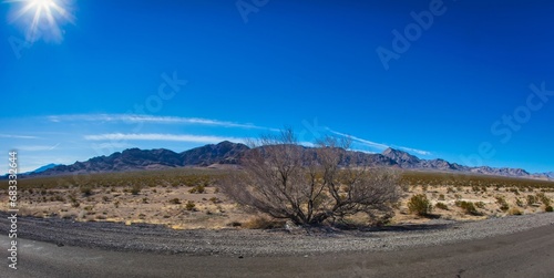 Las Vegas, United States - February 24 , 2013 : The dry desert countryside next to the road during the day between las vegas and los angeles