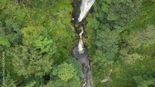 Aerial gimbal up reveal clip of Llanrhaeadr-ym-Mochnant, Pistyll Rhaeadr natural Waterfall in North Wales, Oswestry, Powys, Wales photo