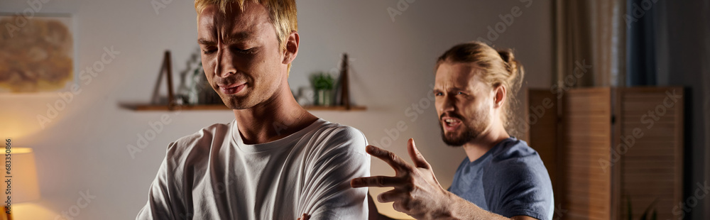 gay lovers quarreling at night in bedroom, relationship difficulties and troubled love, banner gay lovers quarreling at night in bedroom, relationship difficulties and troubled love, banner