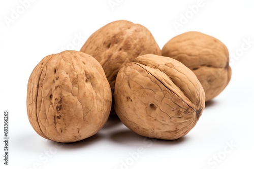 a group of walnuts on a white background