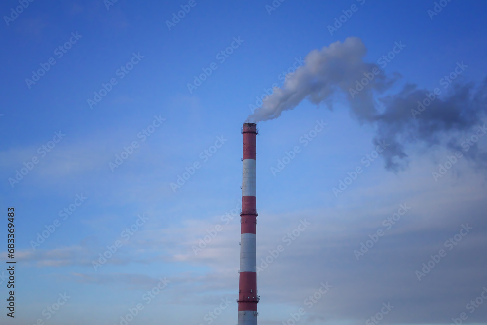 Environmental problem of city air pollution - Industrial construction cranes and building site over Steam and smoke emissions. Environmental problem of city air pollution - Industrial construction cranes and building site over Steam and smoke emissions.