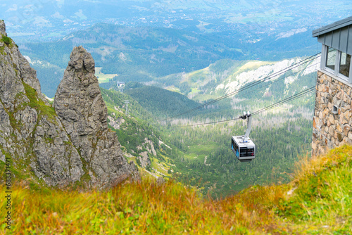 Fototapeta Naklejka Na Ścianę i Meble -  cable car lifting you mountains to the top of Kasprowy Wierch Poland
