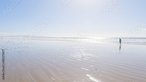 Father and Daughter Winter Stroll on Pismo Beach