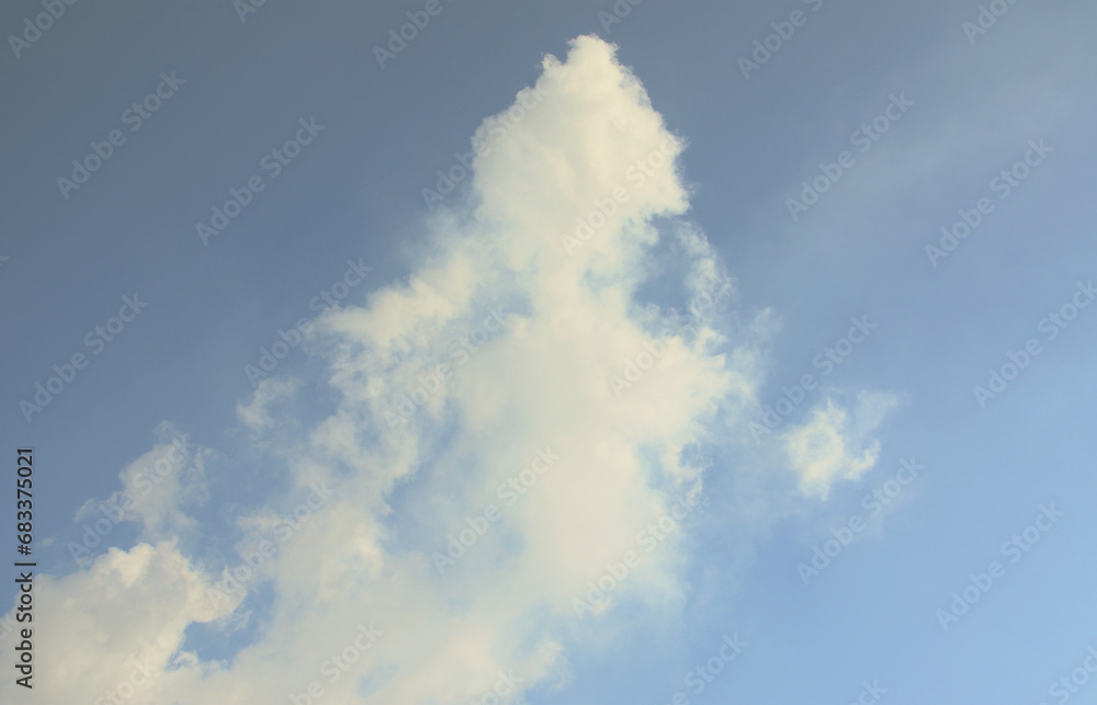 The masses of white smoke released into the air from the pipes of an industrial plant The masses of white smoke released into the air from the pipes of an industrial plant