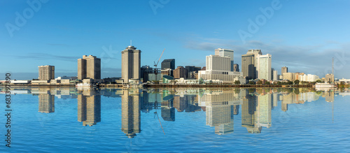 scenic view to New Orleans skyline in morning light from river Mississippi, USA photo