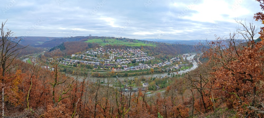 Panoramic view of colorful village Friedland sitting above a bend of river Lahn, Germany