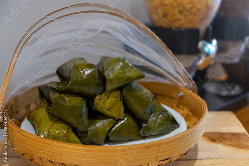 Glutinous Rice Steamed in Banana Leaf on a plate