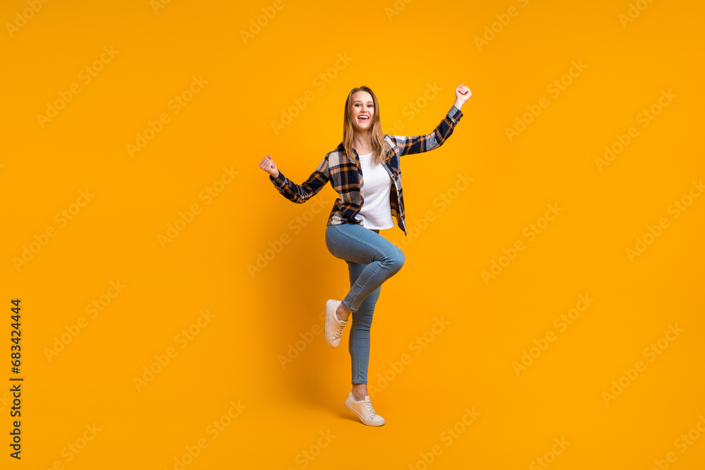 Full size photo of overjoyed lady trying to jump up from delight isolated
