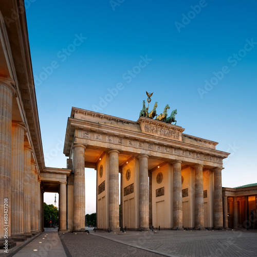 Brandenburg Gate in Berlin  Germany with illumination  copy-space on dark blue sky
