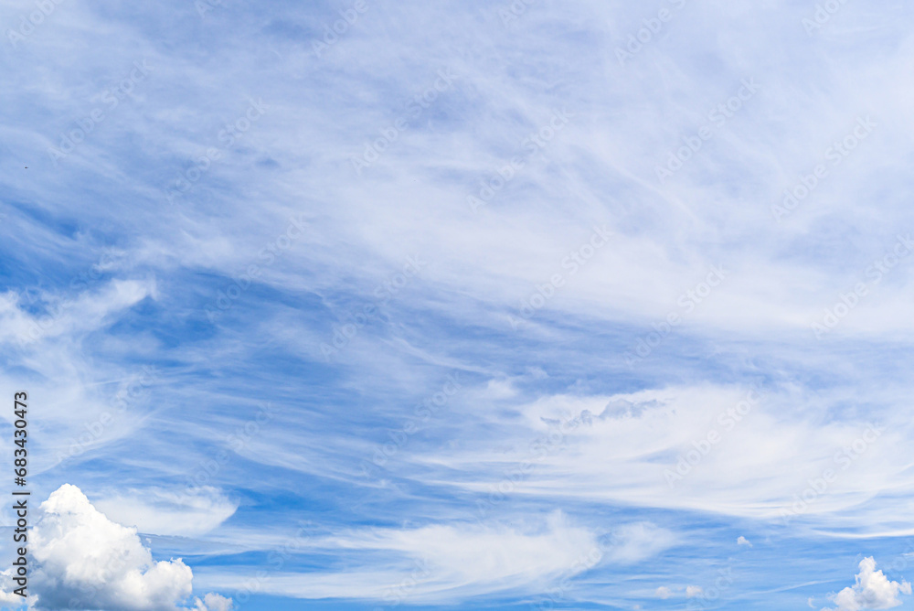 White clouds in a bright blue sky. The beauty of the nature White clouds in a bright blue sky. The beauty of the nature