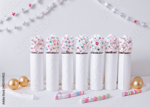 Sparkling bead necklaces, intricate jewellery boxes, and delicate ribbon bows adorn the perfectly wrapped presents, evoking a sense of festive magic and handmade charm. 