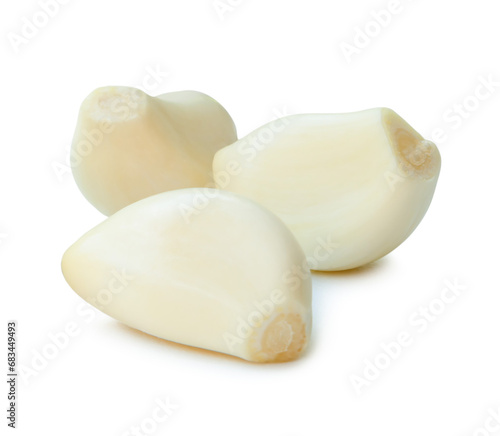 Peeled garlic cloves in stack isolated on white background with clipping path. Front view and flat lay
