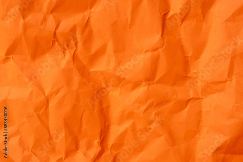Orange crumpled paper texture used for paper background texture in decorative art work